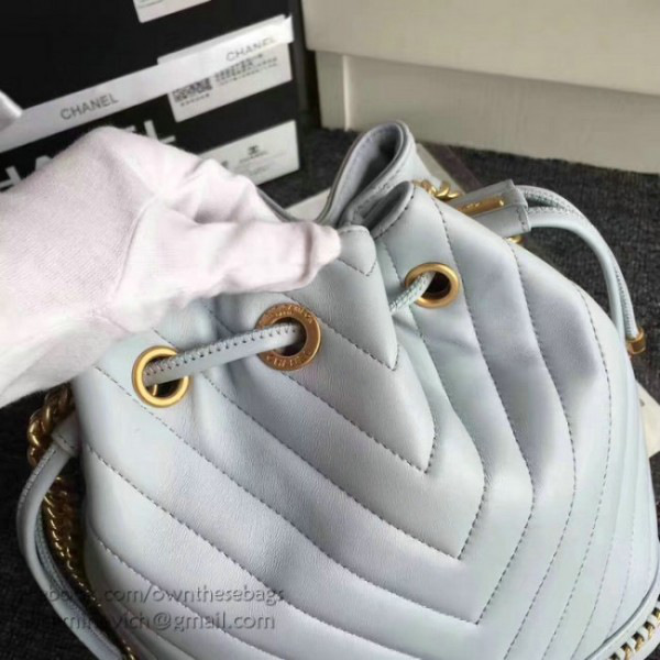 Ch**el lambskin drawstring bucket bag light blue