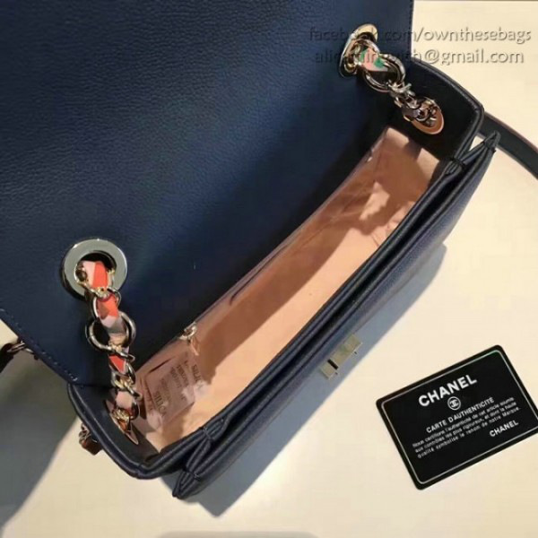 Ch**el grained calfskin flap bag with top handle blue