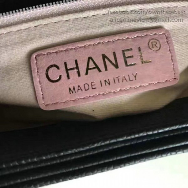 Ch**el grained calfskin flap bag with top handle black