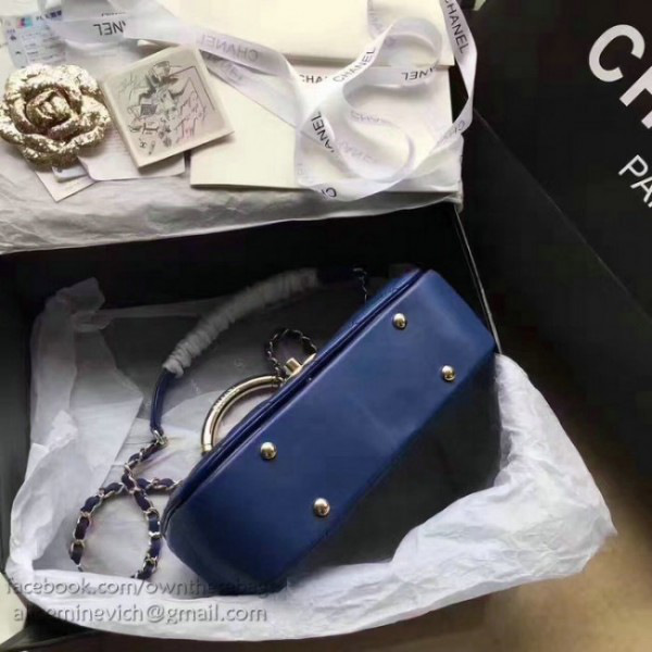 Ch**el caviar quilted lambskin flap bag with top handle blue