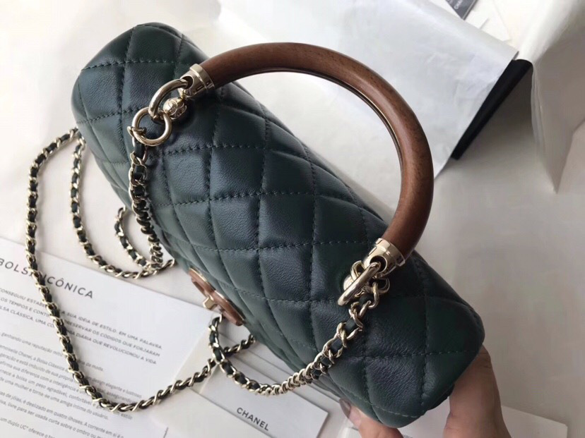 Ch**el flap bag with top handle dark green 21cm