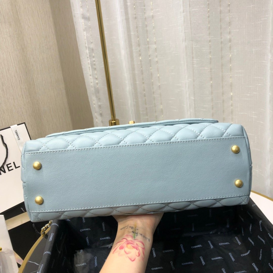 Ch**el maxi flap bag with top handle cornflower 28cm