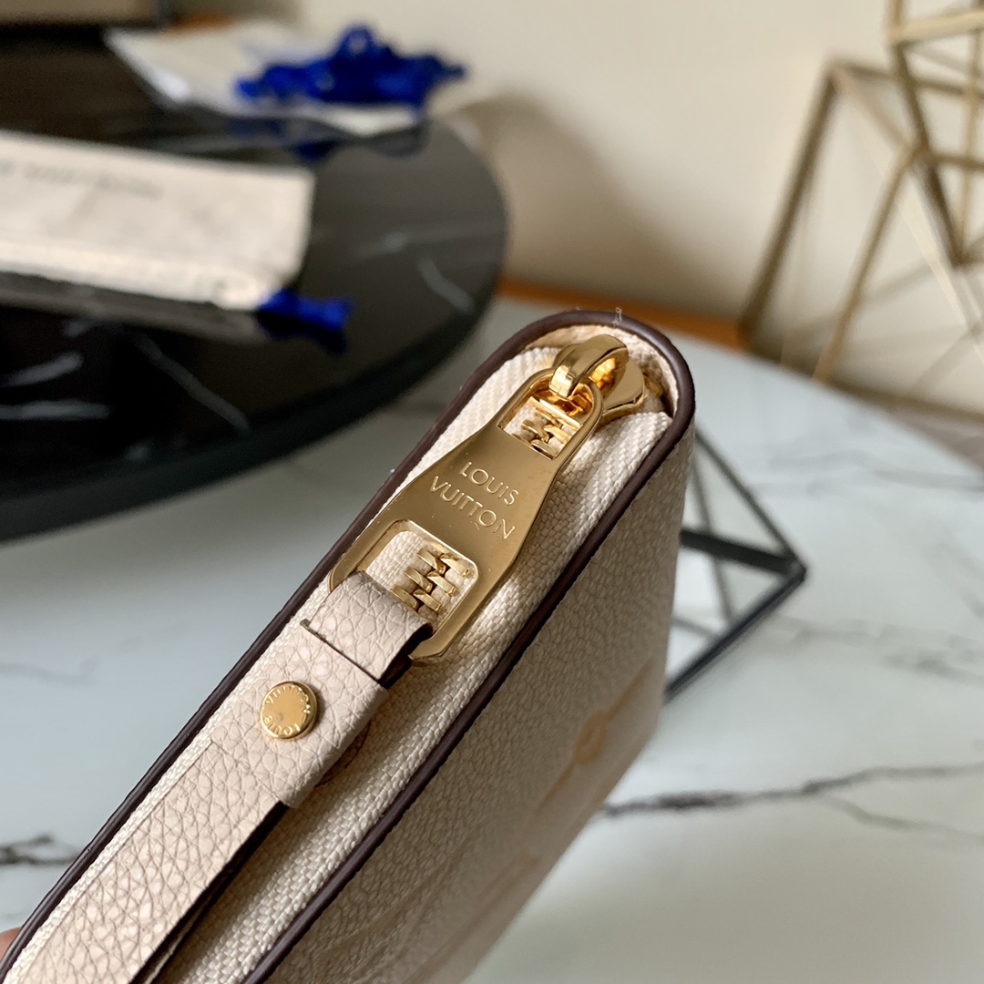 l0vis Vvtt0n by the pool zippy wallet monogram empreinte in cream m80402 19.5 x 10.5 x 2.5 cm