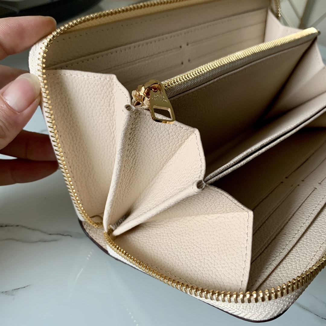 l0vis Vvtt0n by the pool zippy wallet monogram empreinte in cream m80402 19.5 x 10.5 x 2.5 cm