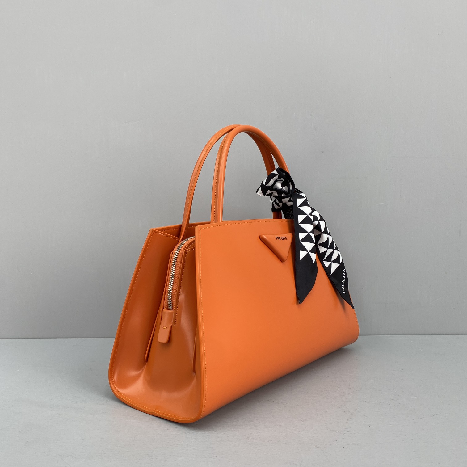 Pra*a miuccia x raf simons orange 33 x 18 x 13.5 cm