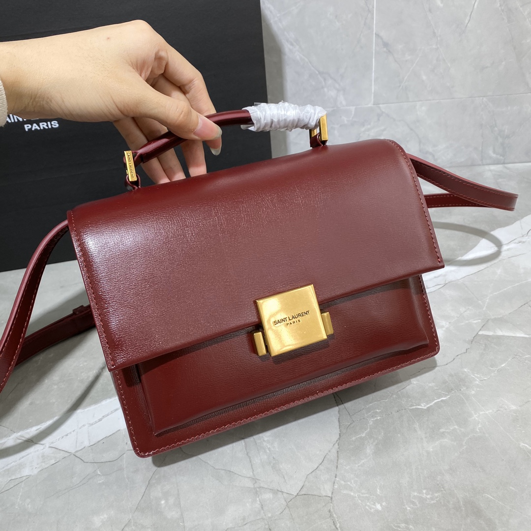 Y51 medium bellechasse in leather burgundy and golden 482051 22 x 16 x 9 cm
