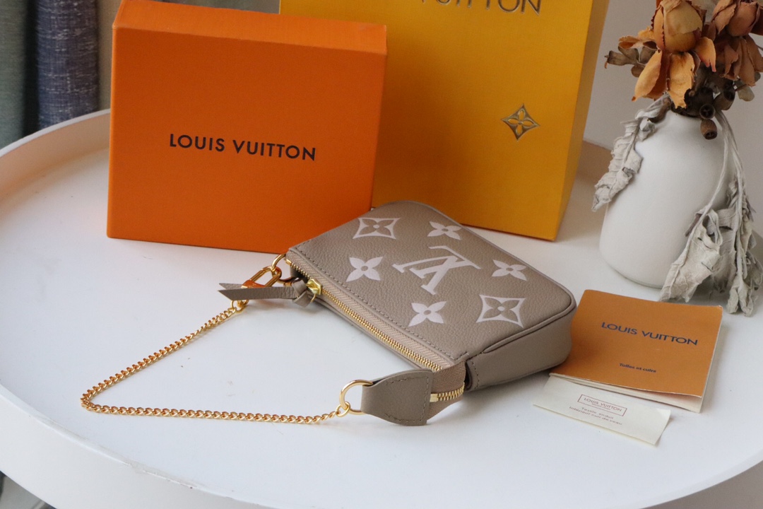 l0vis Vvtt0n mini pochette accessoires bicolor monogram empreinte leather grey m80732 15.5 x 10.5 x 4 cm