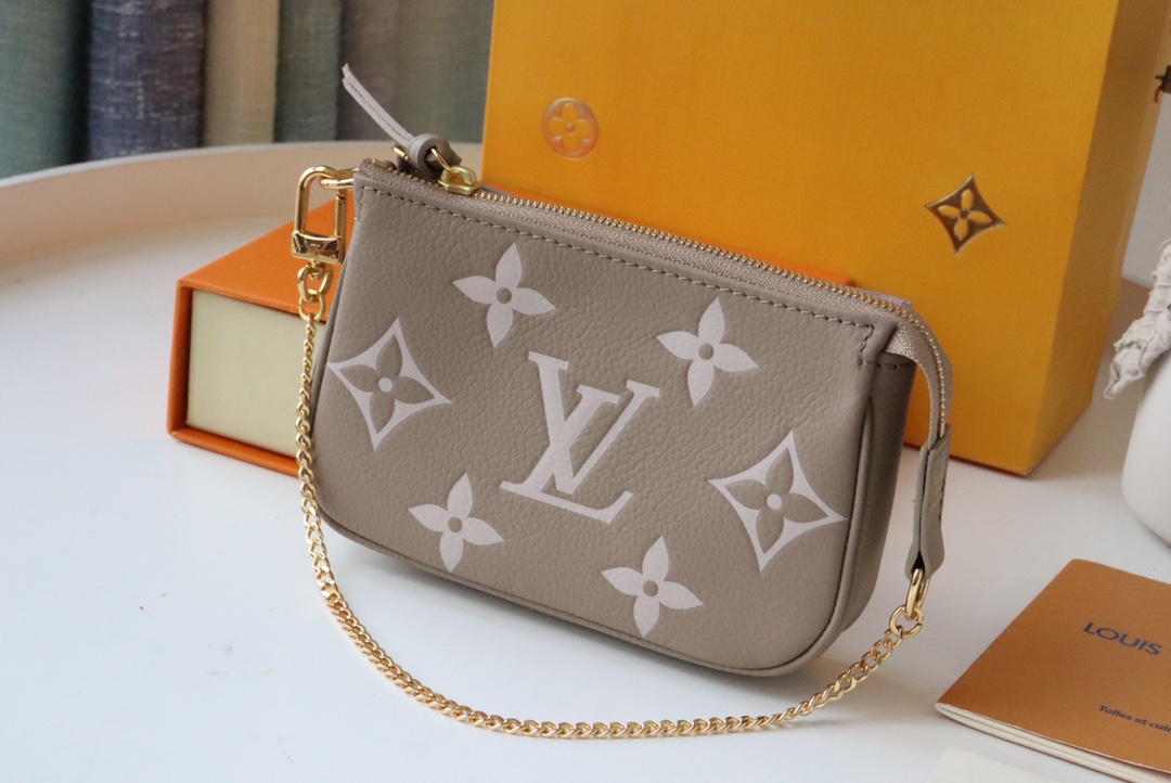 l0vis Vvtt0n mini pochette accessoires bicolor monogram empreinte leather grey m80732 15.5 x 10.5 x 4 cm
