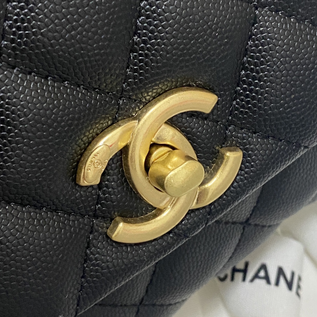 Ch**el flap bag with black top handle grained calfskin gold metal black a92990 23 cm