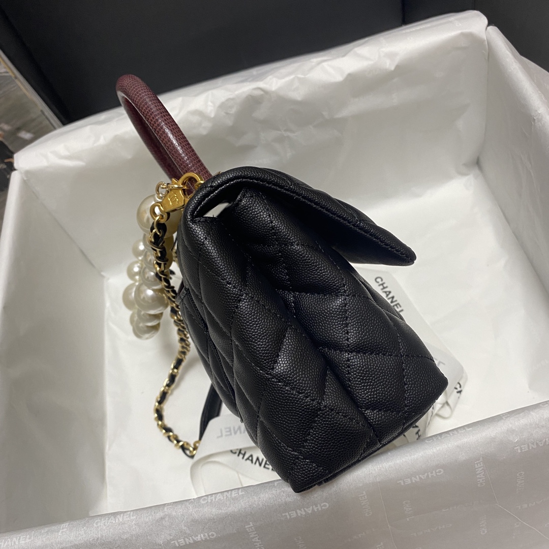 Ch**el flap bag with black top handle grained calfskin gold metal black and burgundy a92990 23 cm