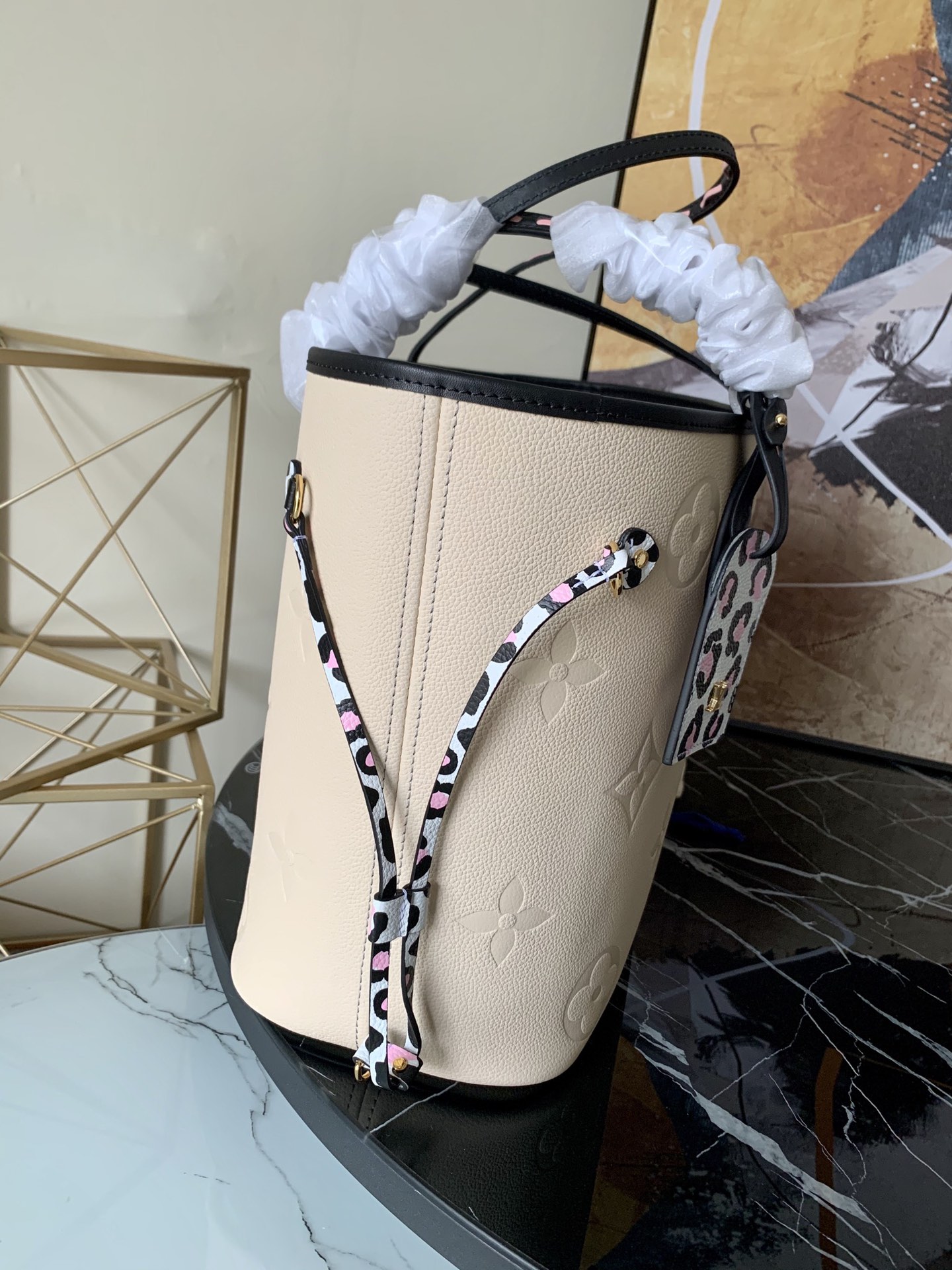 l0vis Vvtt0n neverfull mm monogram empreinte leather creme m58525 32 cm