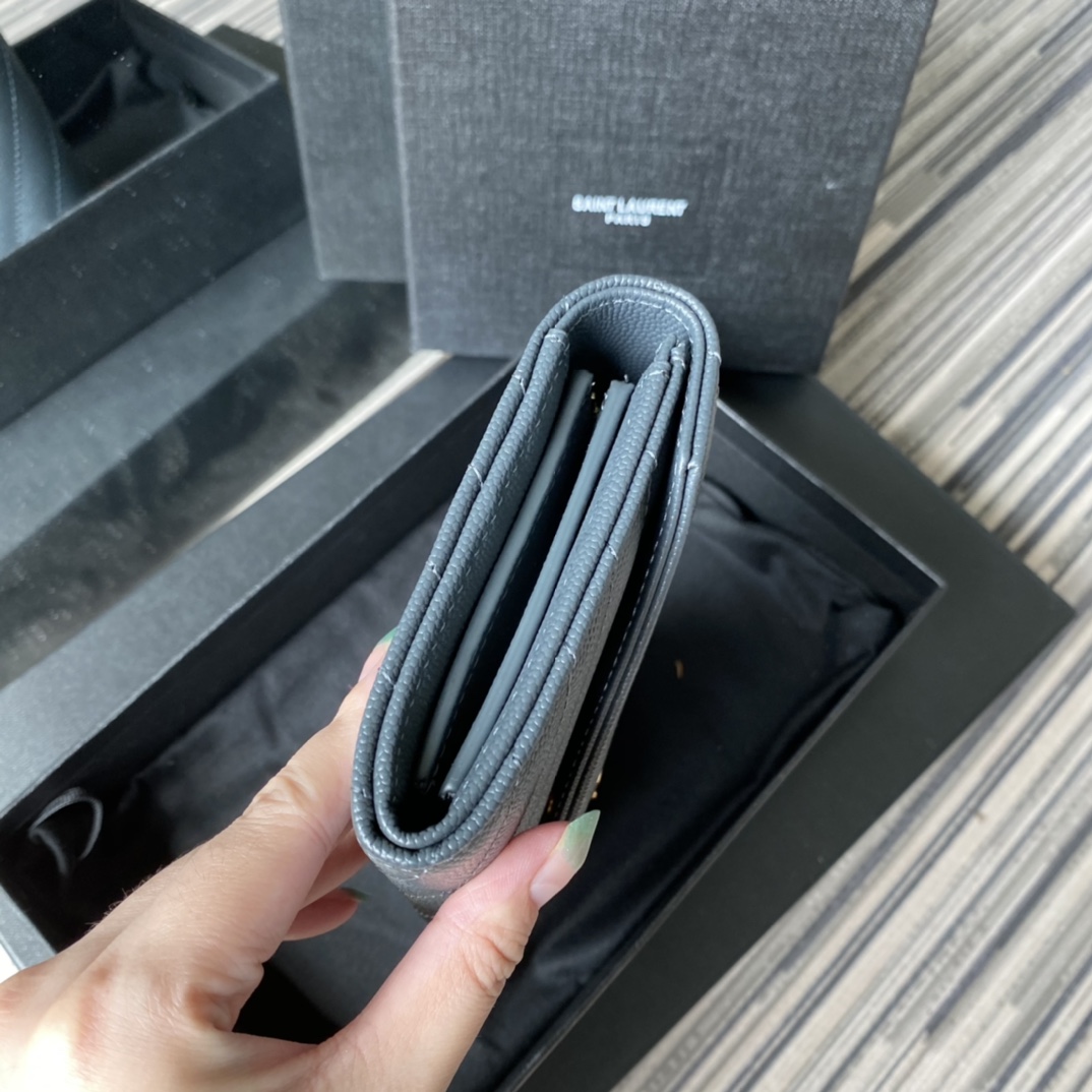 Y51 large monogram flap wallet in grain de poudre embossed leather blue 372264 19 x 11 cm