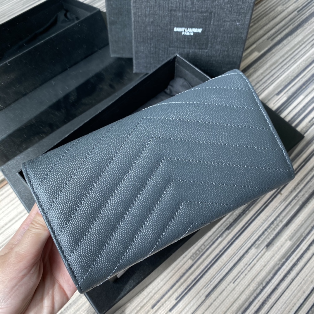 Y51 large monogram flap wallet in grain de poudre embossed leather blue 372264 19 x 11 cm