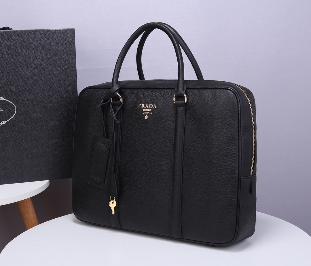 Pra*a briefcase grained cowhide leather golden metal black 8017 40 x 30 x 9 cm