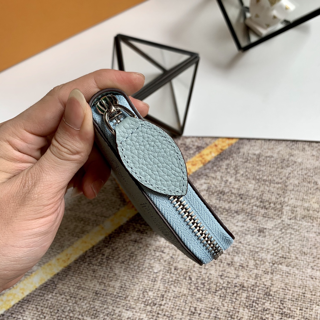 l0vis Vvtt0n zippy wallet monogram perforations mahina leather ver lagon m61867 19 x 10 cm