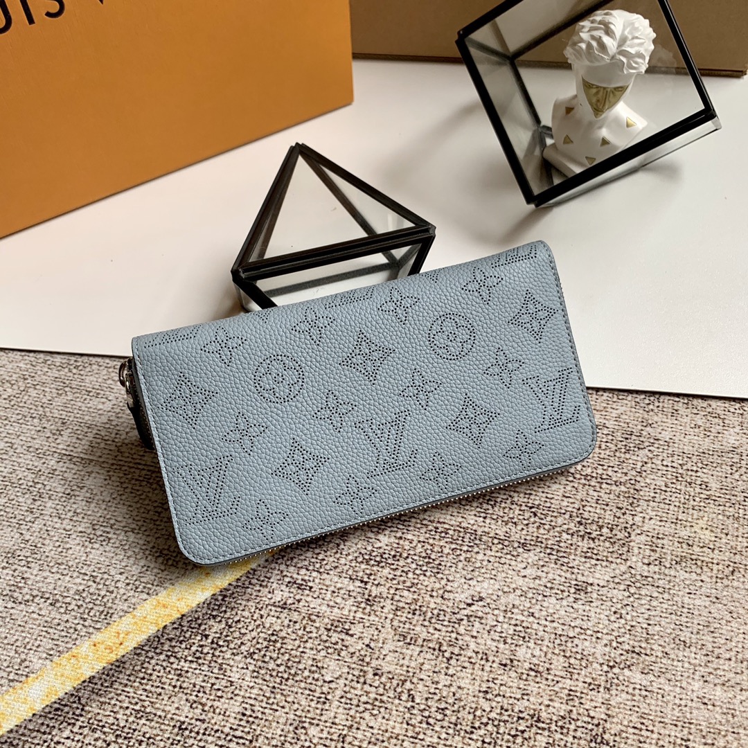 l0vis Vvtt0n zippy wallet monogram perforations mahina leather blue m61867 19 x 10 cm
