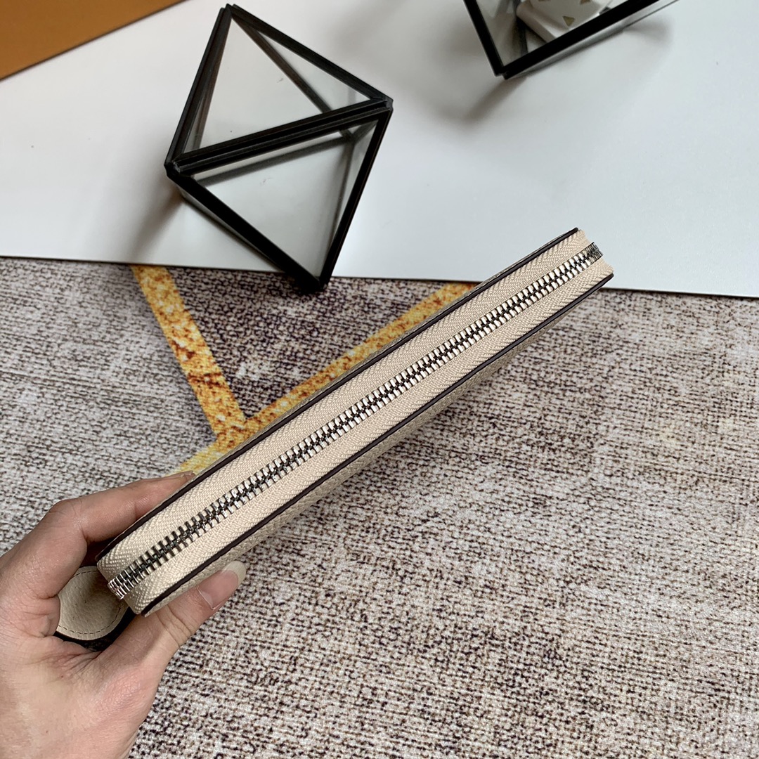 l0vis Vvtt0n zippy wallet monogram perforations mahina leather creme m61868 19 x 10 cm