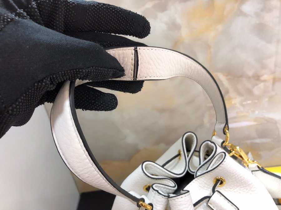 Pra*a bucket bag with metal logo and shoulder strap white 1be030 21 × 25 × 15 cm