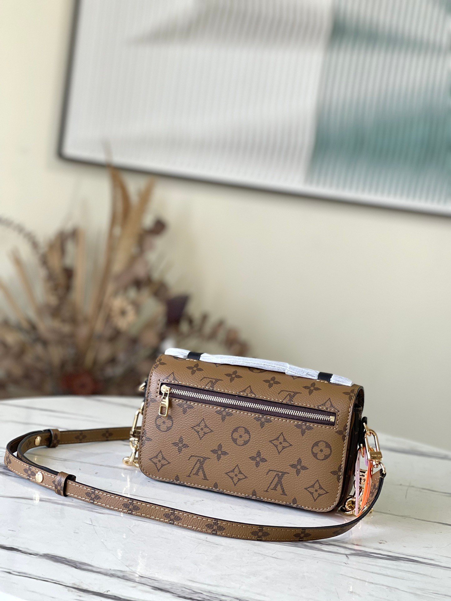 LV Pochette Métis East West M46279 - 21.5cm x 13.5cm x 6 cm